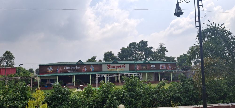 Gangotri Marriage Palace & Om Jhankar banquet building signage